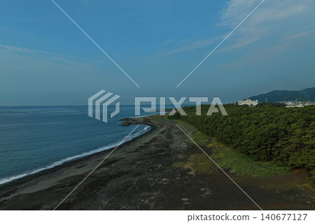 An aerial photograph capturing the black sand beach and pine forest of Miho no Matsubara in Shizuoka Prefecture. An aerial photograph capturing the black sand beach and pine forest of Miho no Matsubara in Shizuoka Prefecture. 140677127