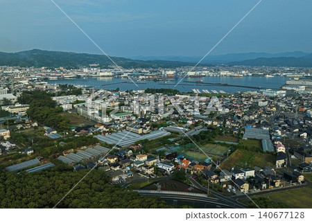 An aerial photograph overlooking the residential area and harbor around Miho no Matsubara in Shizuoka Prefecture. An aerial photograph overlooking the residential area and harbor around Miho no Matsubara in Shizuoka Prefecture. 140677128