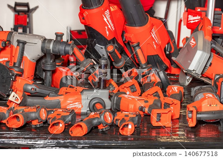 Wide collection of Milwaukee power tools displayed on a table at a trade show during the daytime. 05.14.2026. Kyiv. Ukraine Wide collection of Milwaukee power tools displayed on a table at a trade show during the daytime. 05.14.2026. Kyiv. Ukraine 140677518