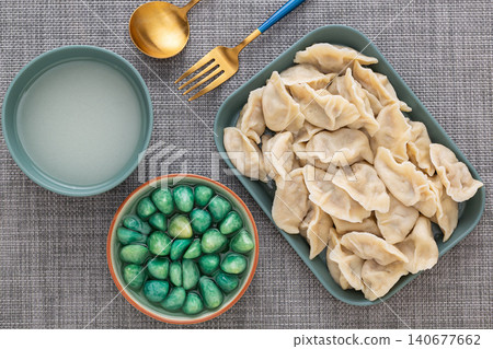 Traditional Chinese Dumplings with Laba Garlic - Winter Festival Food Traditional Chinese Dumplings with Laba Garlic - Winter Festival Food 140677662