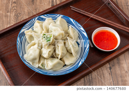 Steamed Mackerel Dumplings on Plate with Dipping Sauce Steamed Mackerel Dumplings on Plate with Dipping Sauce 140677680