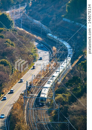 S-curve near Manazuru on the Tokaido Line (commuter train) S-curve near Manazuru on the Tokaido Line (commuter train) 140678134