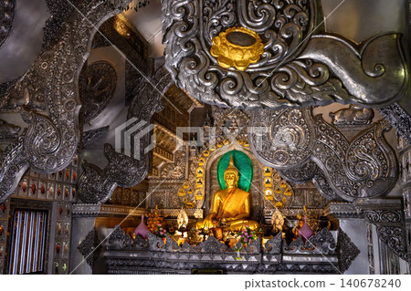 The principal Buddha image in the silver chapel of Sri Suphan temple in Chiang mai, northern Thailand The principal Buddha image in the silver chapel of Sri Suphan temple in Chiang mai, northern Thailand 140678240