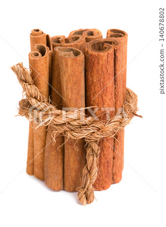 cinnamon on white background cinnamon on white background 140678802