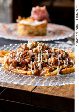 Loaded French Fries with Chicken, Caramelized Onion and Garlic Sauce Loaded French Fries with Chicken, Caramelized Onion and Garlic Sauce 140678962
