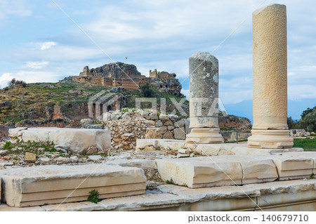 Acropolis, temple of Kronos of ancient Greek city Tlos in Lycia located on Lycian way. Famous historical site In Antalya region. Popular place for family travel on summer vacation. Fethiye, Turkey Acropolis, temple of Kronos of ancient Greek city Tlos in Lycia located on Lycian way. Famous historical site In Antalya region. Popular place for family travel on summer vacation. Fethiye, Turkey 140679710