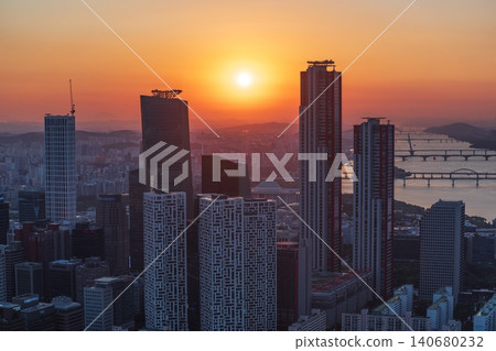 Golden sunset over the financial district of Yeouido with modern corporate skyscrapers in Seoul, South Korea 140680232