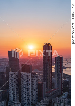 Golden sunset over the financial district of Yeouido with modern corporate skyscrapers in Seoul, South Korea Golden sunset over the financial district of Yeouido with modern corporate skyscrapers in Seoul, South Korea 140680234