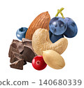 Chocolate, almond, peanut, cashew nut, cranberry, blueberry and grapes isolated on white background 140680339