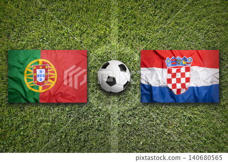 Portugal vs. Croatia flags on soccer field Portugal vs. Croatia flags on soccer field 140680565
