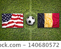 USA vs. Belgium flags on a soccer field 140680572