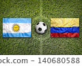 Argentina vs. Colombia flags on a soccer field 140680588