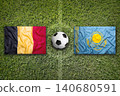 Belgium vs. Kazakhstan flags on soccer field 140680591