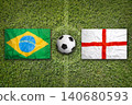 Brazil vs. England flags on soccer field 140680593