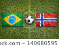 Brazil vs. Norway flags on soccer field 140680595