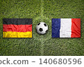 Germany vs. France flags on soccer field 140680596