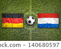 Germany vs. Netherlands flags on soccer field 140680597