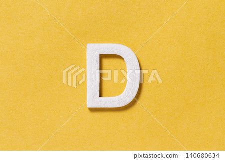 Letter D of the alphabet isolated on yellow background, top view 140680634