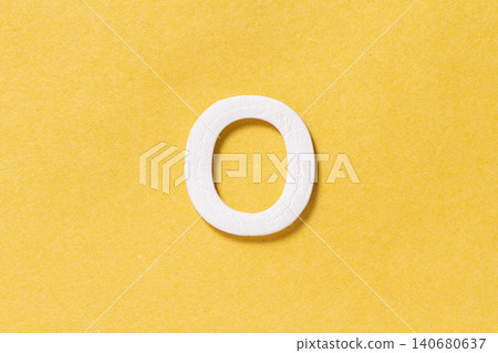 Letter O of the alphabet isolated on yellow background, top view 140680637