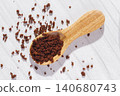 Instant coffee in the wooden spoon 140680743