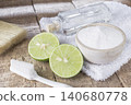 baking soda and lemon on wooden table 140680778