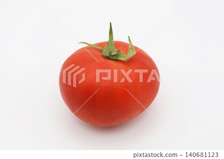A simple image of one ripe tomato against a white background. 140681123