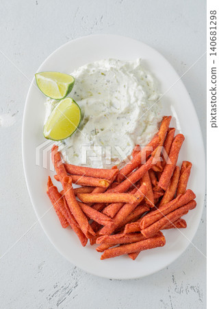 Spicy Takis Fuego Served With Garlic Herb Cream Cheese Dip Spicy Takis Fuego Served With Garlic Herb Cream Cheese Dip 140681298