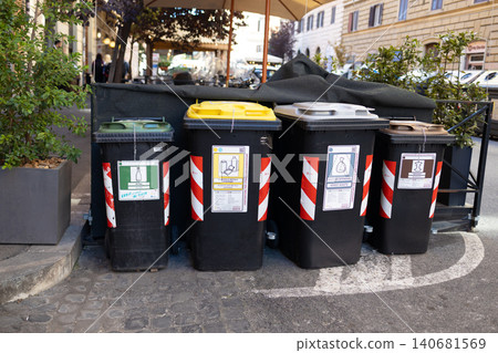 Row of waste sorting recycling bins on city street in Rome Italy Row of waste sorting recycling bins on city street in Rome Italy 140681569