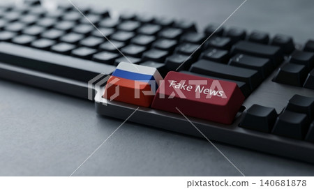 Digital keyboard featuring custom keys with russian flag and fake news text symbolizing online misinformation and propaganda tactics in global media 140681878