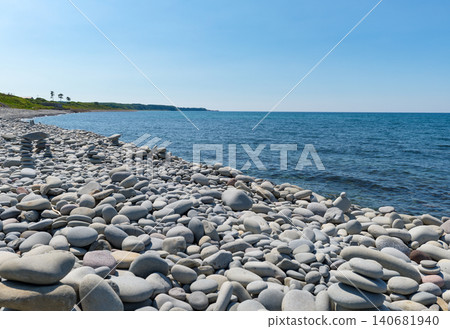 A white pebble beach stretches across Nariishi Beach. A white pebble beach stretches across Nariishi Beach. 140681940