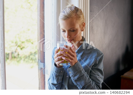 Relax, smelling and woman with coffee in a house for morning drink, caffeine or comfort beverage in her home. Tea, aroma and female person chilling in a living room of day off, weekend or vacation 140682294