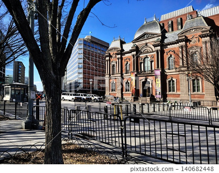 The Renwick Gallery, part of the Smithsonian American Art Museum, located in Washington, DC, USA. The foreground is blocked by rows of black metal security barriers. The Renwick Gallery, part of the Smithsonian American Art Museum, located in Washington, DC, USA. The foreground is blocked by rows of black metal security barriers. 140682448