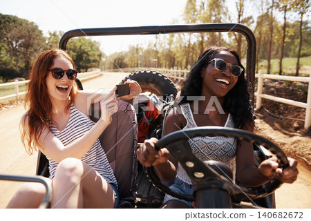 Happy women, photography and vacation with road trip in nature and bonding together for adventure in outdoor. Friends, driving or journey in convertible van on holiday, countryside or memory in texas Happy women, photography and vacation with road trip in nature and bonding together for adventure in outdoor. Friends, driving or journey in convertible van on holiday, countryside or memory in texas 140682672