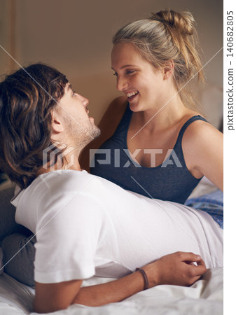 Relax, love and couple in a bed talking, bonding and resting in their home from together. Wake up, conversation and people in a bedroom with morning speaking, chat or chilling in a house on weekend Relax, love and couple in a bed talking, bonding and resting in their home from together. Wake up, conversation and people in a bedroom with morning speaking, chat or chilling in a house on weekend 140682805