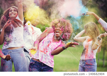 Friends, happiness and powder paint at color festival in park, fun with celebration or party outdoor. Freedom, bonding and colorful mess in nature, joy and culture with people at summer event Friends, happiness and powder paint at color festival in park, fun with celebration or party outdoor. Freedom, bonding and colorful mess in nature, joy and culture with people at summer event 140682904