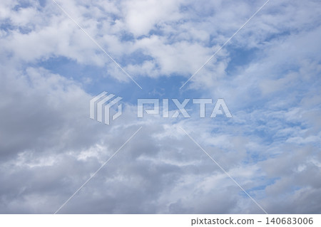 Sky cloud blue white overcast weather atmosphere nature scene with soft cumulus and stratocumulus, calm daylight background for forecast, climate concept, copy space in wide sky Sky cloud blue white overcast weather atmosphere nature scene with soft cumulus and stratocumulus, calm daylight background for forecast, climate concept, copy space in wide sky 140683006