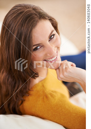 Woman, portrait and relax on home sofa for holiday weekend with smile for calm break, peace or comfortable. Female person, face and couch in apartment living room or morning resting, cozy or carefree Woman, portrait and relax on home sofa for holiday weekend with smile for calm break, peace or comfortable. Female person, face and couch in apartment living room or morning resting, cozy or carefree 140683048