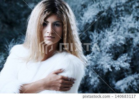 Woman, winter and fashion portrait by tree, attitude and pride for fur coat or warm clothes. Female person, serious face and confident in fluffy jacket or nature, forest and trendy or outdoor outfit Woman, winter and fashion portrait by tree, attitude and pride for fur coat or warm clothes. Female person, serious face and confident in fluffy jacket or nature, forest and trendy or outdoor outfit 140683117