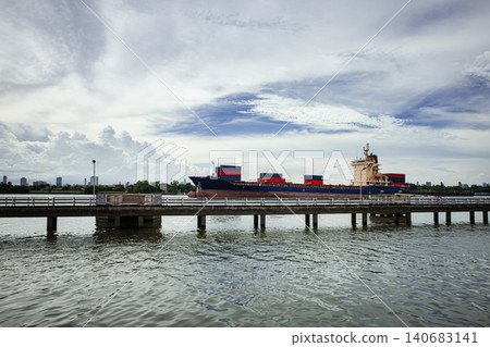 Cargo ship water bridge sky cloud river Cargo ship water bridge sky cloud river 140683141