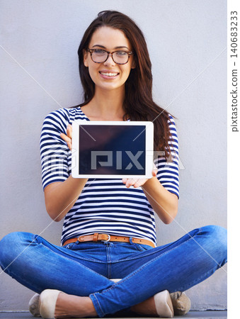 Young woman, portrait or tablet screen for display or technology on digital app for education by wall background. Student, smile or face with touchscreen for online research or connectivity to learn Young woman, portrait or tablet screen for display or technology on digital app for education by wall background. Student, smile or face with touchscreen for online research or connectivity to learn 140683233