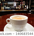 A cup of coffee to enjoy a relaxing time at the bar counter. 140683544