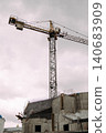 Orthodox church construction with tower crane 140683909