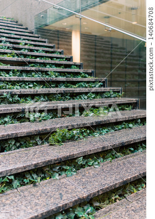 Outdoor staircases that incorporate nature into urban spaces 140684708