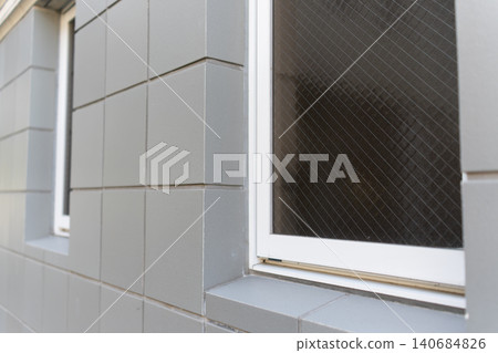 Simple and stylish exterior wall tiles and window textures Simple and stylish exterior wall tiles and window textures 140684826