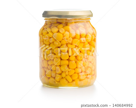 Jar Of Preserved Corn Kernels On White Background For Pantry And Cooking Use 140684992