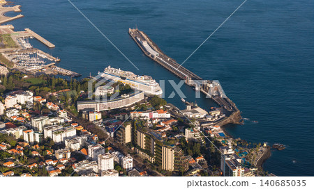 Aerial of Funchal harbor, breakwater pier, cruise ship, Casino da Madeira Aerial of Funchal harbor, breakwater pier, cruise ship, Casino da Madeira 140685035
