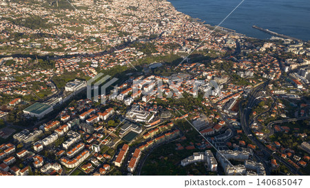 Aerial view of Funchal, Madeira, terracotta roofs and harbor Aerial view of Funchal, Madeira, terracotta roofs and harbor 140685047