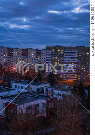Minsk twilight microdistrict with Soviet era blocks and warm windows 140685094