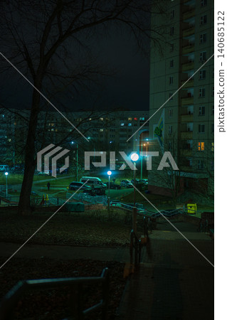 Night street scene in Minsk microdistrict with 48 banner facade Night street scene in Minsk microdistrict with 48 banner facade 140685122