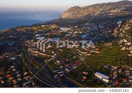Aerial coastal hillside city on Madeira Island with Atlantic view 140685163